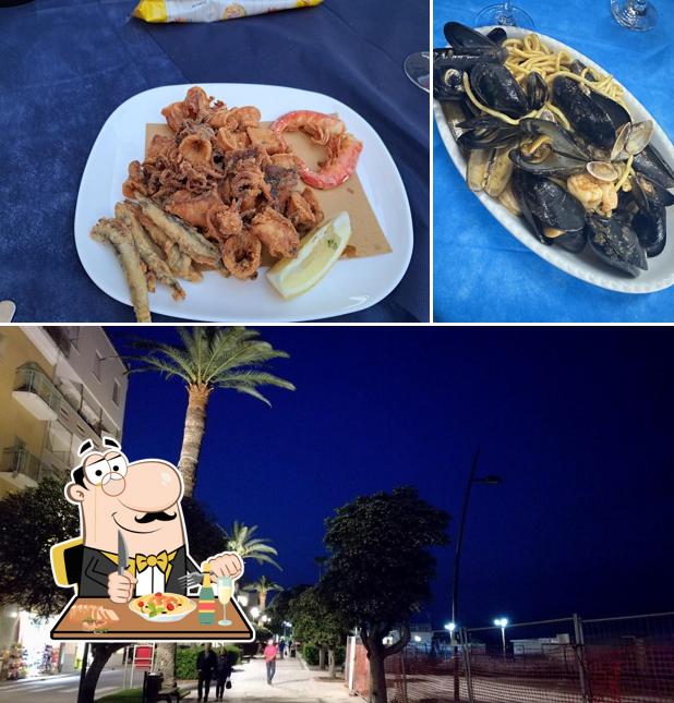 Dai un’occhiata alla foto che presenta la cibo e esterno di Bastion Contrario