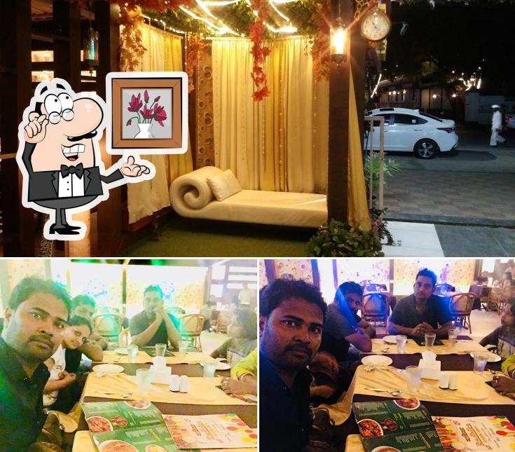 The interior of Hotel Radhika AC Family Garden Restaurant