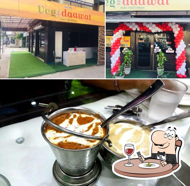 This is the picture showing food and interior at Veg Daawat