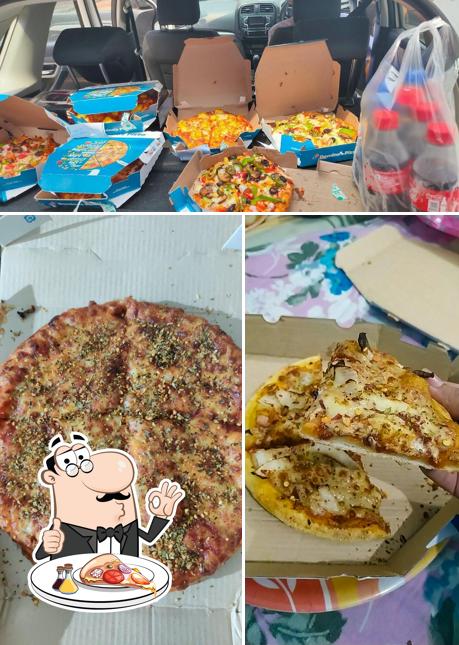 Try out pizza at Domino's Pizza Mubarik Mehal Colony, Sangrur