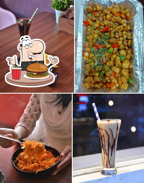 Try out a burger at Momo magic cafe मोमो मेजिक कैफे