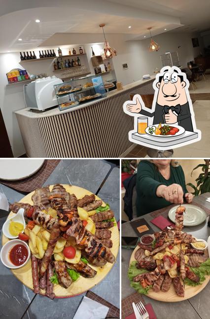 Guarda la immagine che mostra la cibo e interni di Vanity Grill Bar