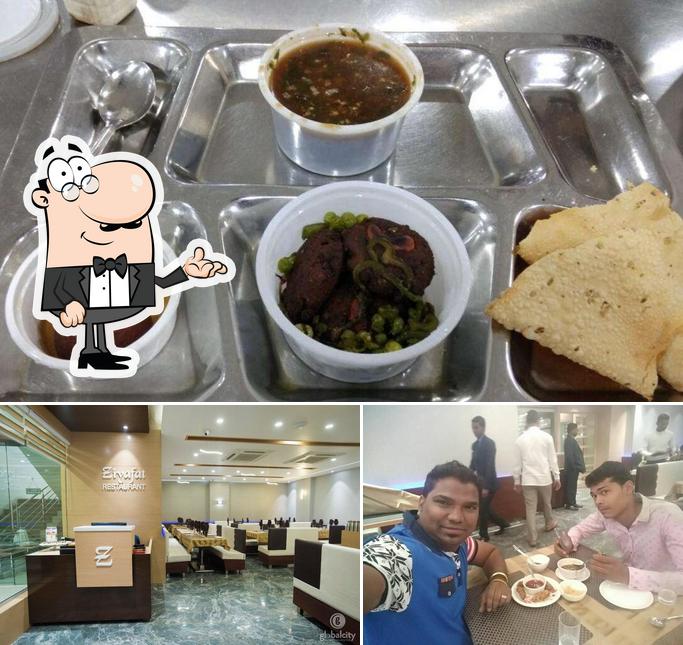 This is the photo displaying interior and food at Ziyafat Restaurant