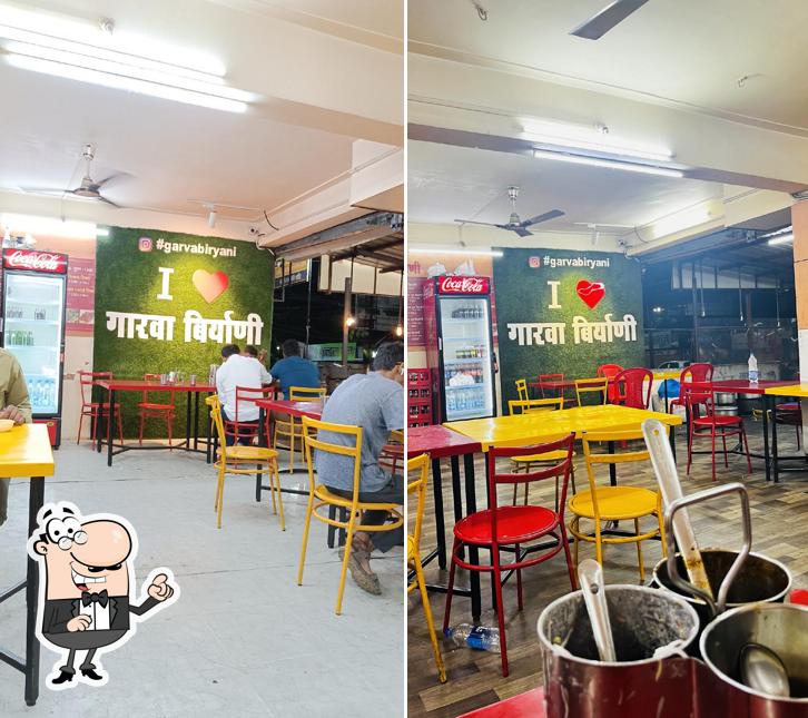 Take a seat at one of the tables at Garva Biryani