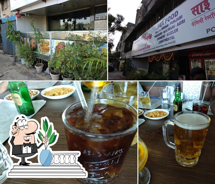 The photo of Hotel Sai Pooja Family Restaurant’s exterior and drink