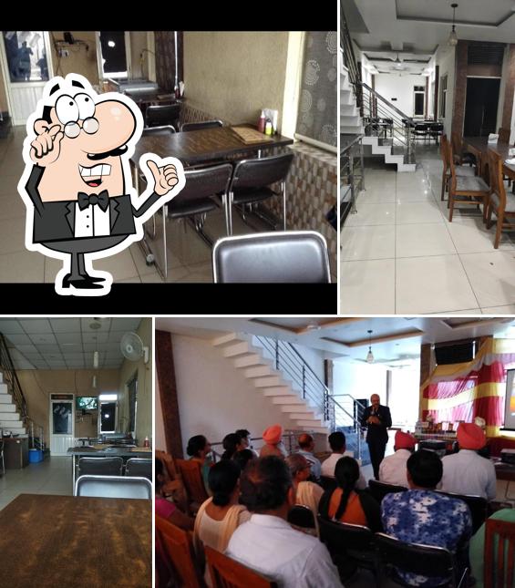 Take a seat at one of the tables at Hotel Paradise Dream (Restaurant & Banquets)