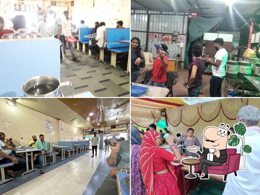 Take a seat at one of the tables at Hari Om Dal Bati