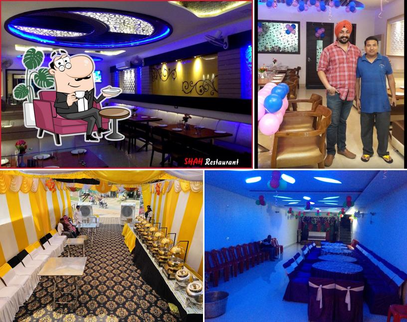 Take a seat at one of the tables at Shah restaurant and outdoor catering