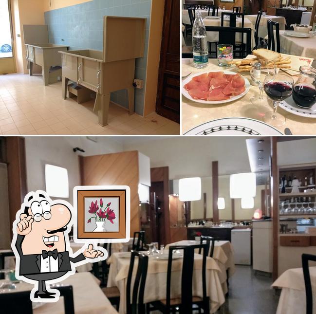 Tra le diverse cose da Ristorante Massena si possono trovare la interni e tavolo da pranzo