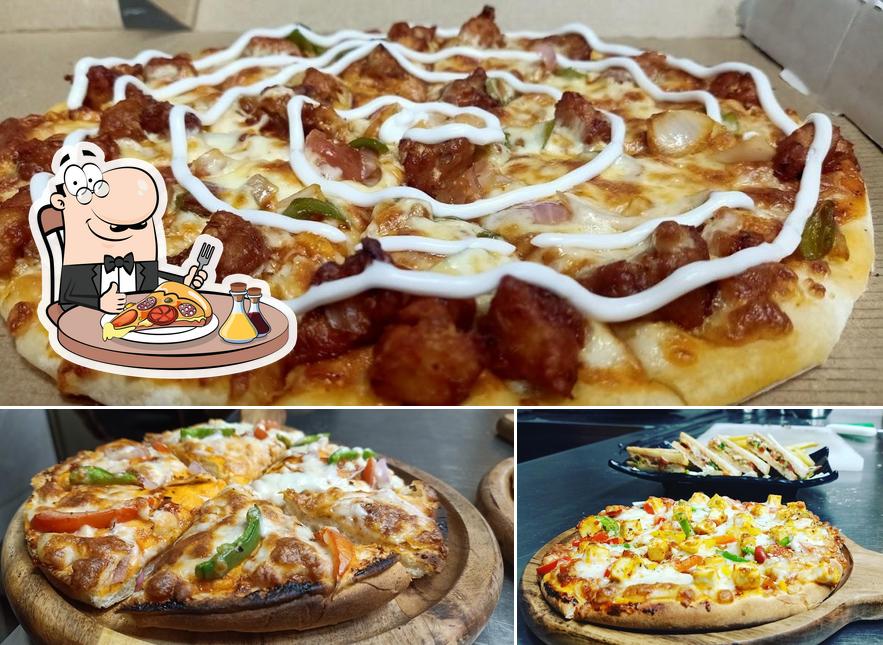 Pick pizza at Rustic Cafe & Restro