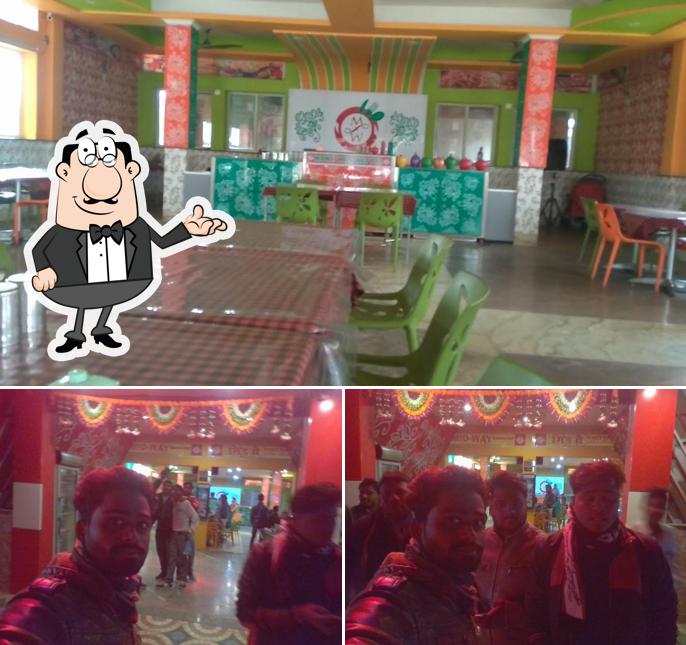 The interior of MIDWAY PURE VEG RESTAURANT & RESORT