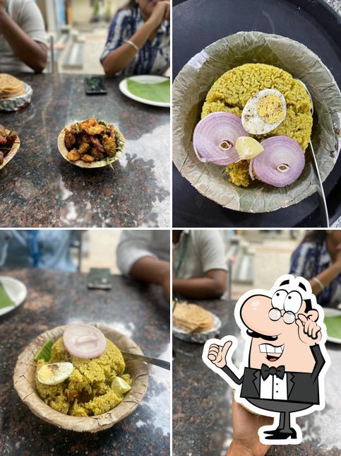 Take a look at the photo depicting interior and food at ARV Donne Biryani