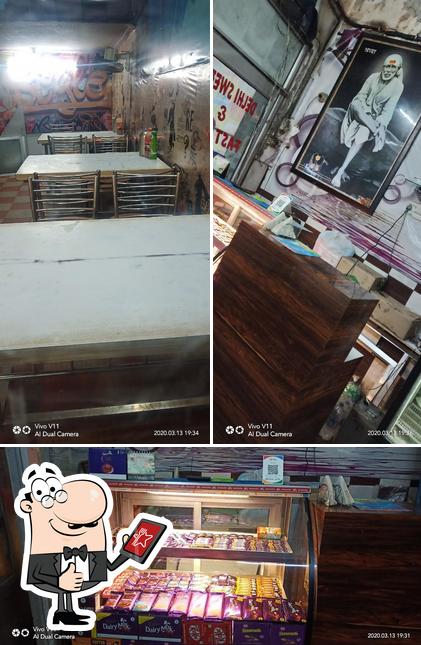 Look at the pic of DELHI SWEETS & FAST FOOD