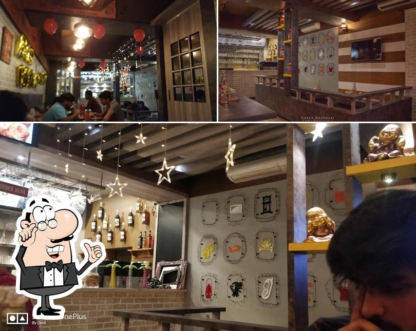 Take a seat at one of the tables at JUST BAKE CAKE SHOP & COFFEE HOUSE