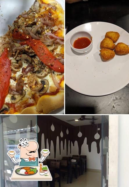 Take a look at the photo showing food and exterior at Josh pizzeria