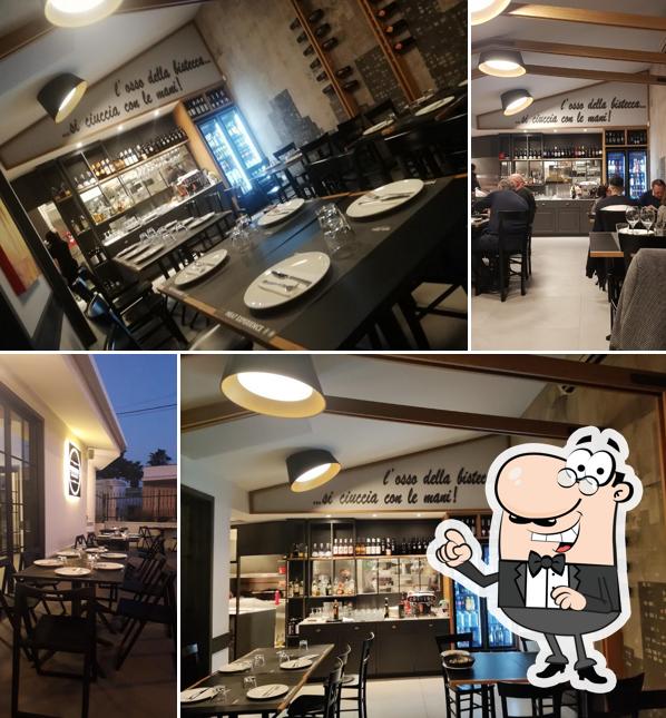 Dai un'occhiata agli interni di MUU GRILL Meat Experience