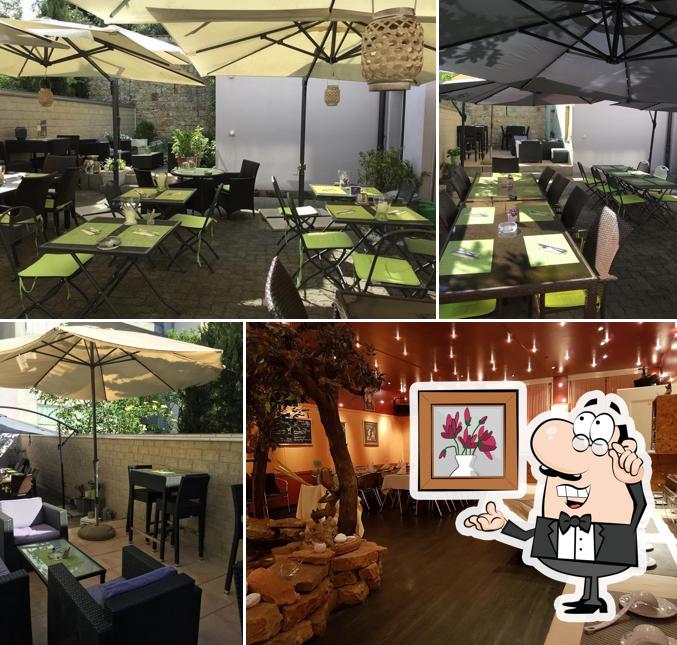 Siediti a un tavolo di Bar Restaurant 100 GmbH