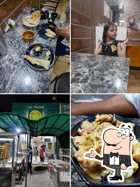 Take a seat at one of the tables at PUNJABI CHAAP CORNER