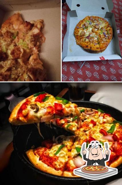Get pizza at Pondicherry Fast Food