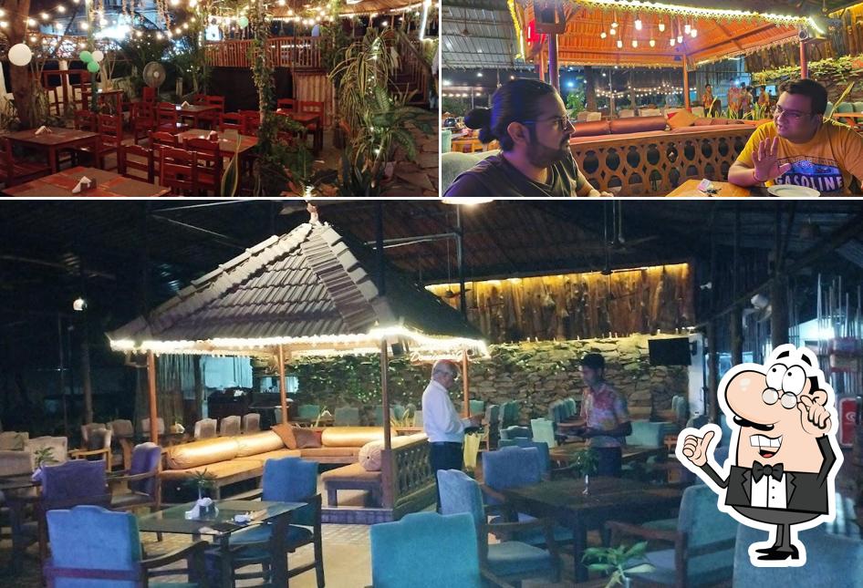 Take a seat at one of the tables at Domingos Gazebo Restaurant