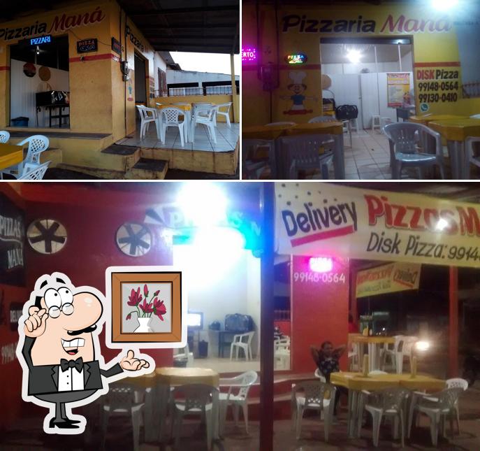 Veja imagens do interior do Pizzaria Maná