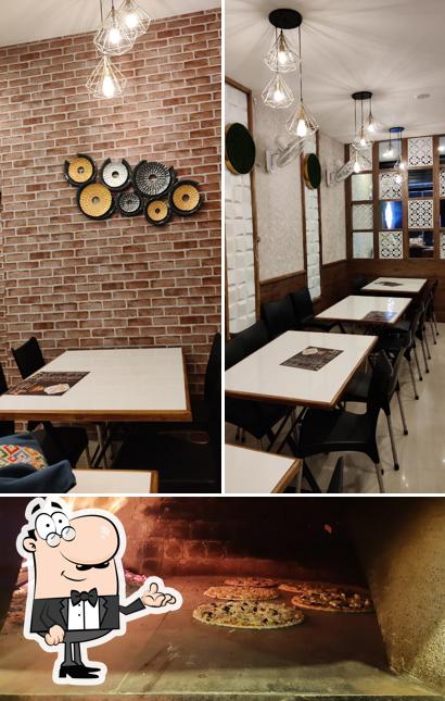 Among different things one can find interior and beverage at Pizzaa Clan Among different things one can find interior and beverage at Pizzaa Clan