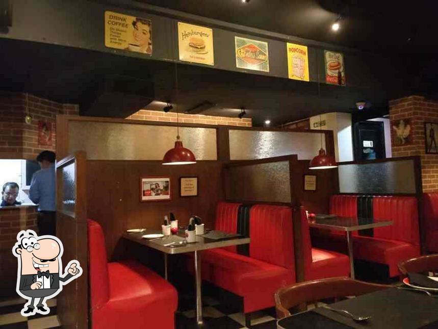 Take a seat at one of the tables at TOMATO'S