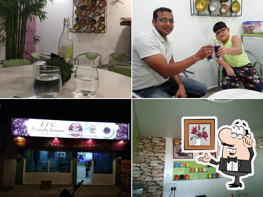 Take a seat at one of the tables at Friends Forever Cafe Restrobar