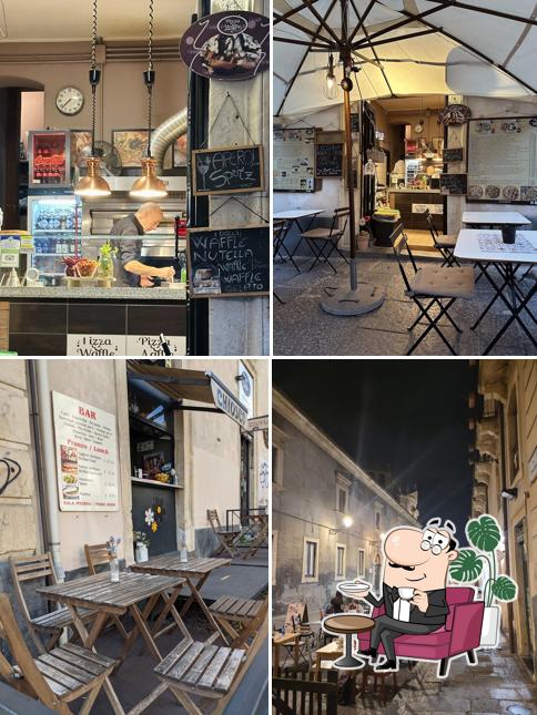 Siediti a un tavolo di Pizza and Waffle