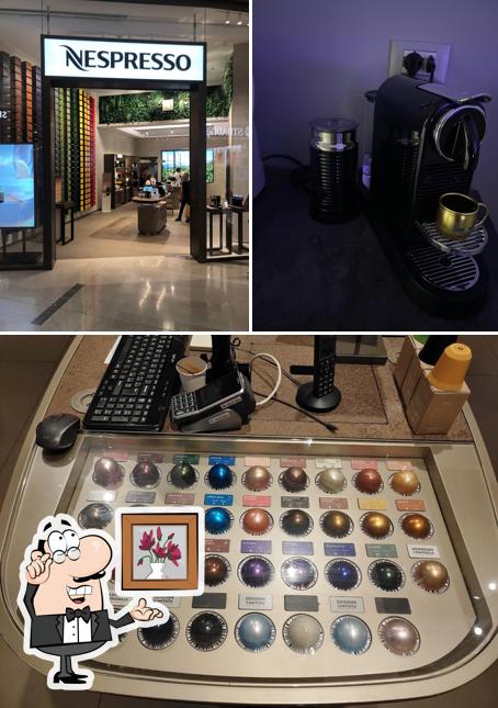 Tra le diverse cose da Boutique Nespresso Gran Reno si possono trovare la interni e cibo