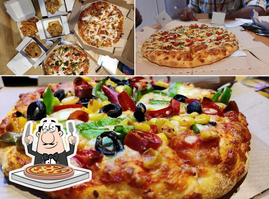 At Domino's Pizza Shivaji Nagar, Thanjavur, you can taste pizza