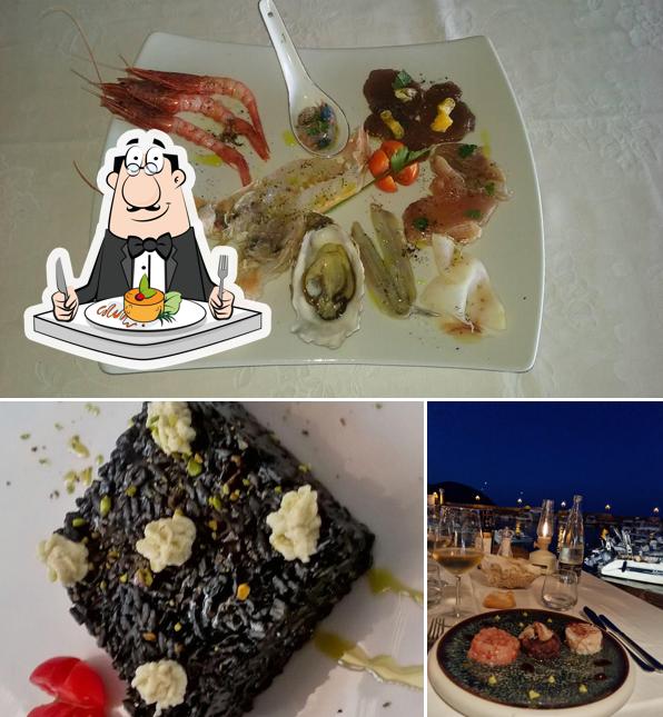 La immagine di cibo e tavolo da pranzo da Ristorante Al Pirata