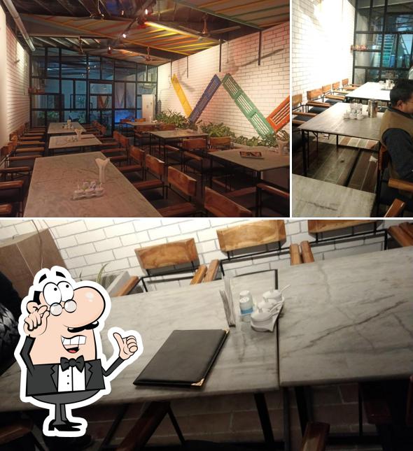 Take a seat at one of the tables at Kapino Food Hub