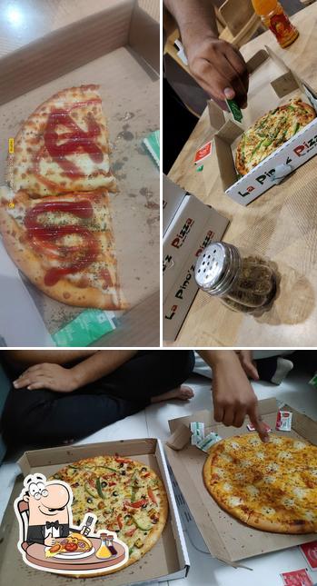 Order pizza at RANGOLI ICE CREAM