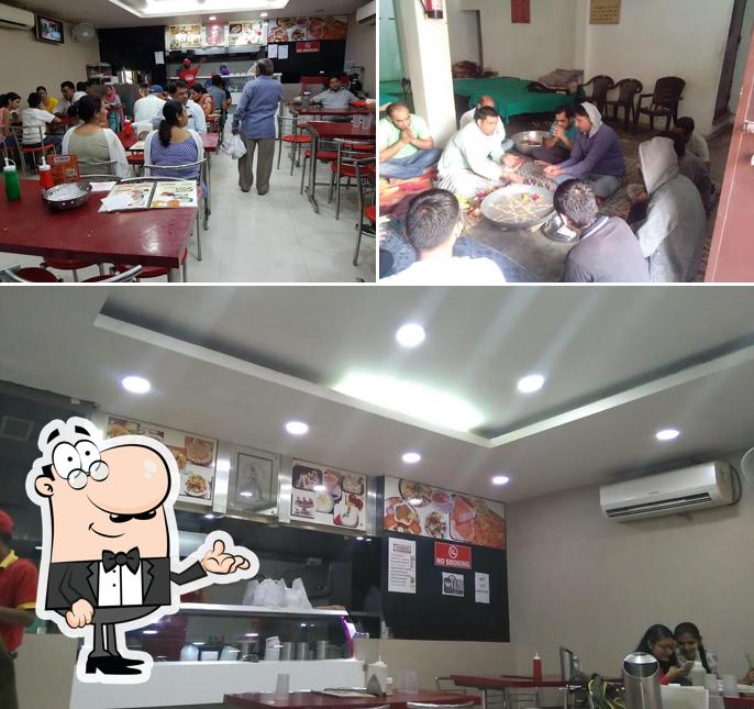 Take a seat at one of the tables at Milk point