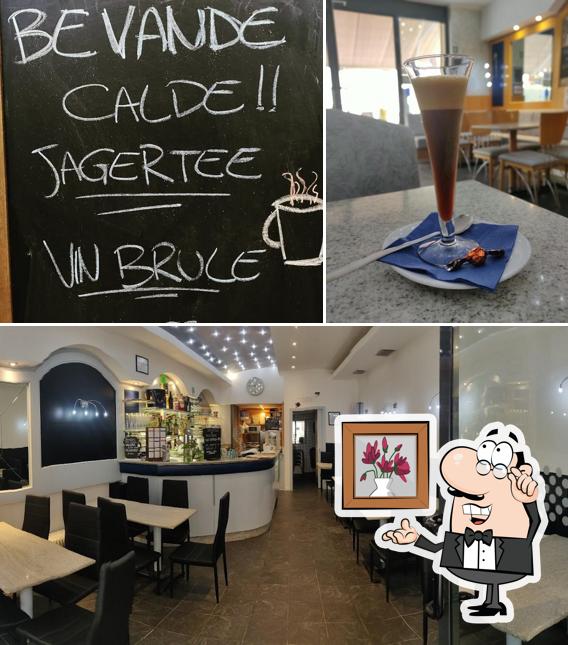 Questa è la immagine che raffigura la interni e lavagna di Bar Patrick Pk