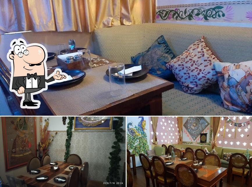 Take a seat at one of the tables at Baa Bistro