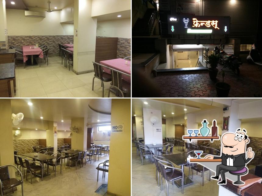 Take a seat at one of the tables at Hotel New Friend's Pure Veg