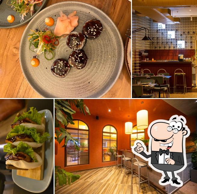 Take a seat at one of the tables at Iza Pan-Asian Kitchen