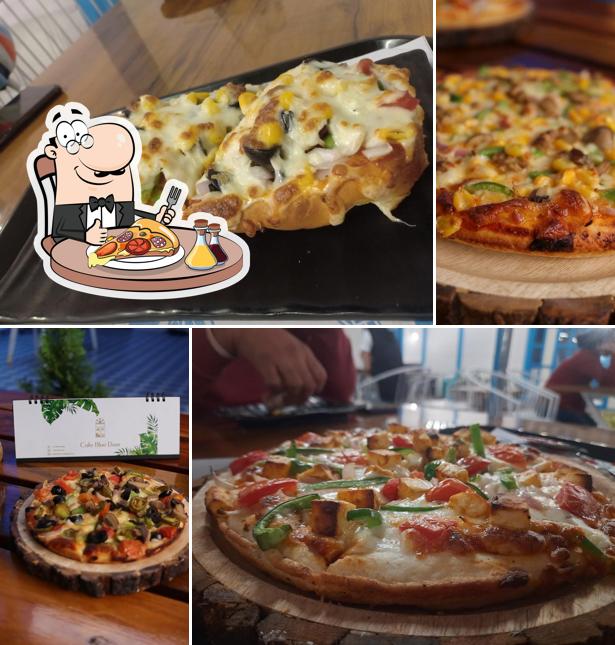 Try out pizza at Cafe Blue Door
