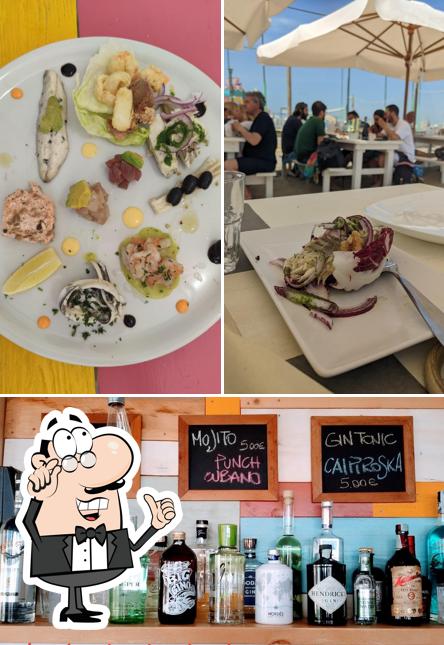 Questa è la immagine che presenta la interni e bevanda di Tre Stelle 80