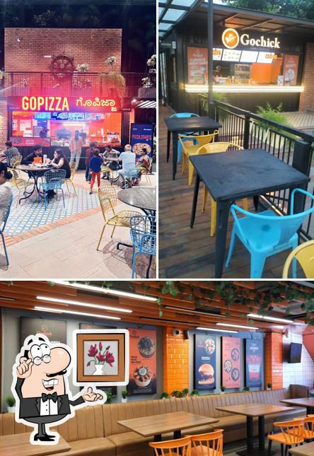 Take a seat at one of the tables at Gochick, Litbox whitefield