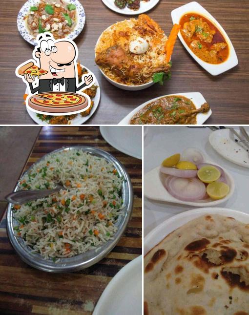Pick pizza at Mohini Multicuisine Restaurant