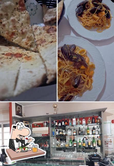 Guarda la immagine che raffigura la cibo e bancone da bar di Ristorante Pizzeria San Giorgio san donato Milanese