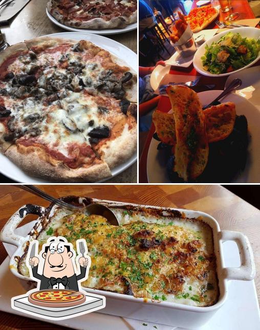 Essayez des pizzas à Bar & Co