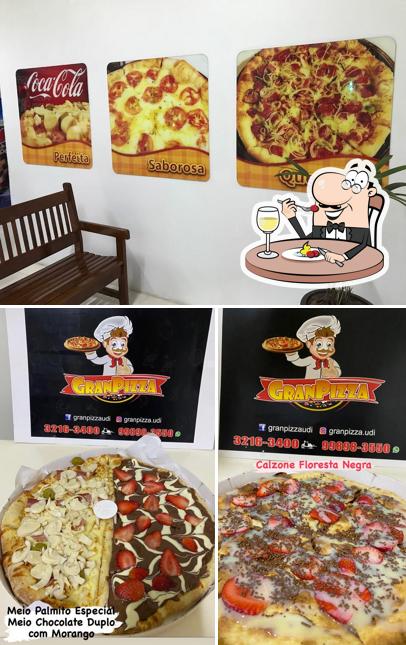Esta é a imagem apresentando comida e interior a Gran Pizza - Pizzaria
