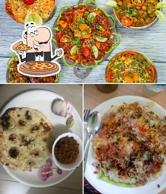 Pick pizza at Hotel Sainidhi