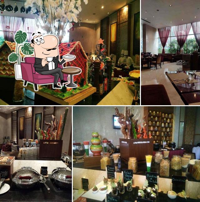 Check out how Cafe Treat - The Pride Hotels looks inside
