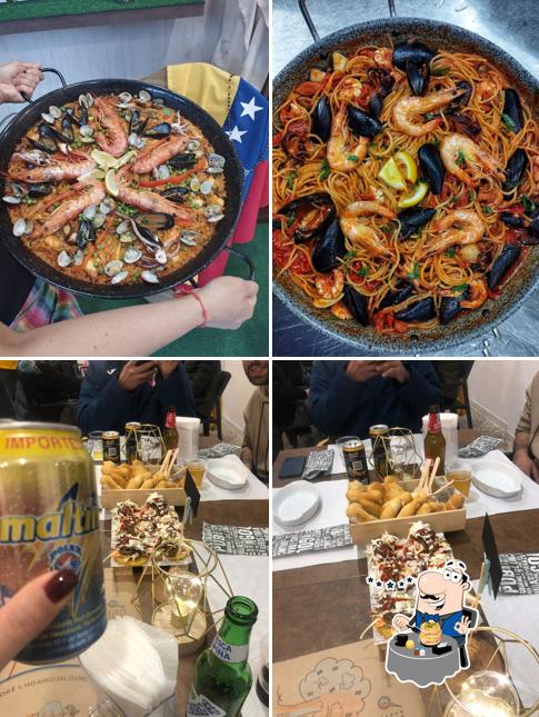 Questa è la immagine che presenta la cibo e interni di Sapori della Cucina