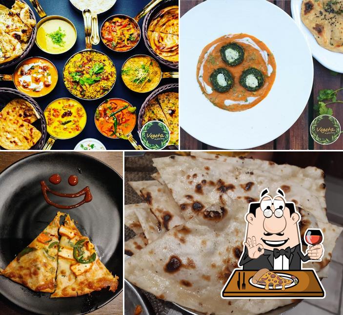 Order pizza at Vegeta - Fine Dine & LOUNGE